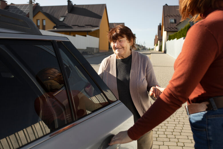 person-helping-their-elder-neighbour